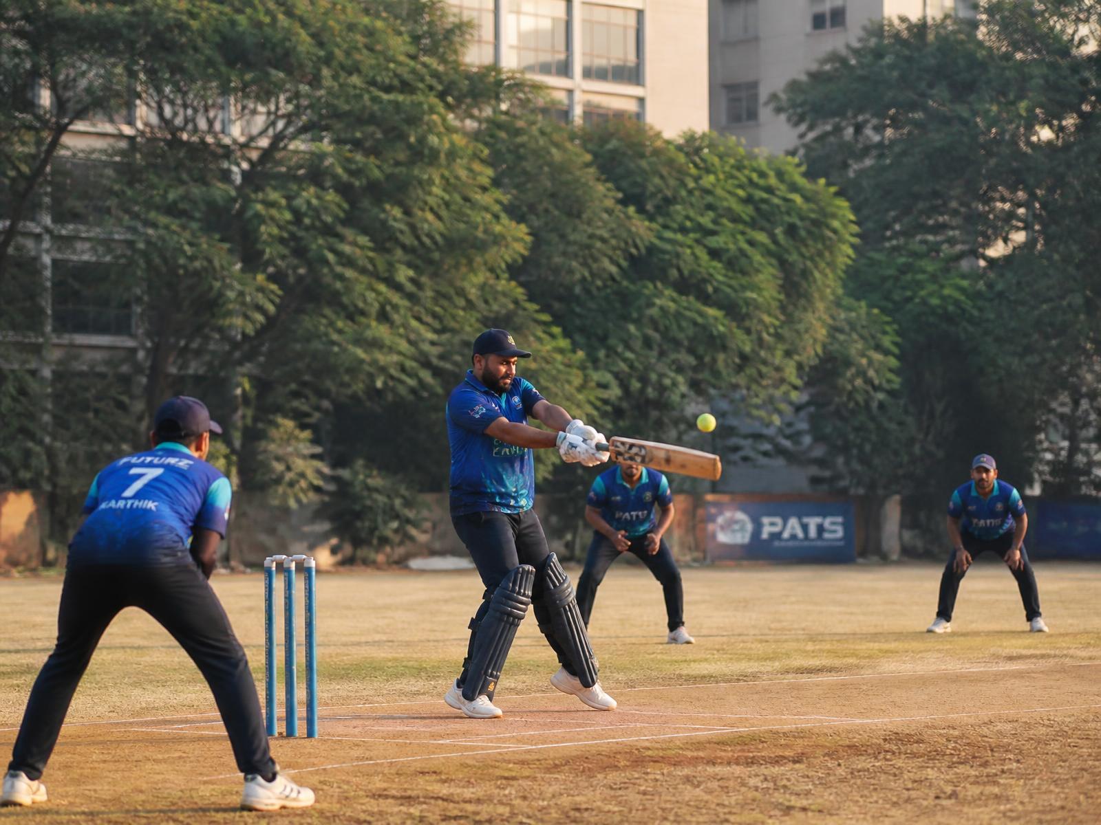 Corporate cricket team playing a match at Loyola College Ground, Chennai